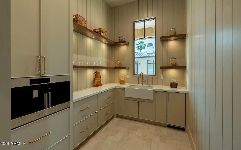 Butler’s pantry cabinetry and appliance wall